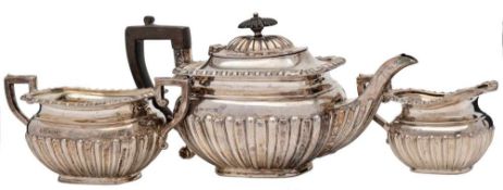A George V silver three-piece tea service.