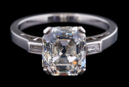 A diamond single-stone ring: the Asscher-cut diamond approximately 8.2mm long x 7.4mm wide x 4.