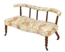 A pair of Victorian walnut love seats:, of shaped outline, one upholstered in a pastel green fabric,