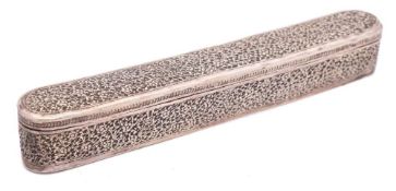 An Islamic Ottoman silver pen case and cover: chased and engraved overall with scrolling flowering