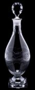 A Georgian glass decanter and stopper: of Indian Club shape cut with interlocking bands of stylised