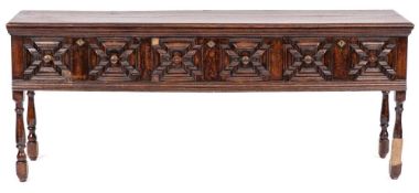 A late 17th Century oak rectangular dresser base:, the top with a moulded edge,