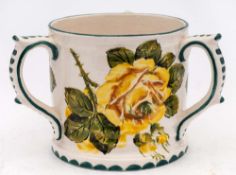 An Exon Ware Wemyss pottery tyg: decorate with green, yellow and white cabbage roses, painted Exon,