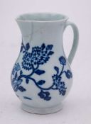 A Liverpool [Richard Chaffers] blue and white baluster cream jug: painted with chrysanthemum and
