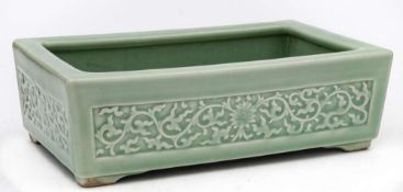 A Chinese celadon jardiniere: of squat rectangular form,
