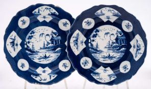 A pair of First Period Worcester powder blue ground deep plates: with gadrooned rims,