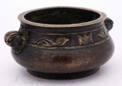 A Chinese bronze censer: of circular squat form,