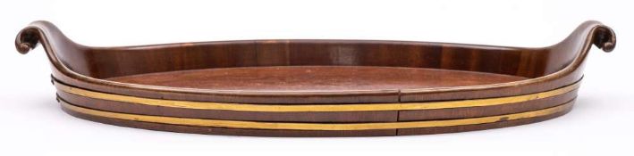 A Georgian mahogany and brass bound tray: of oval outline with scrolling handles to the sides, 67cm.