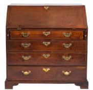 A George III mahogany bureau:,