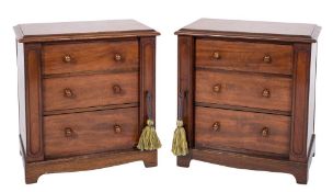 A pair of Victorian mahogany collector's chests of Wellington type:,