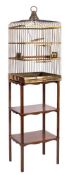 A brass wirework square parrot cage: with slightly domed top and central brass ring handle,