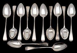 Twelve George III silver Old English pattern dessert spoons,