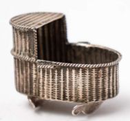 A Continental silver crib, bears import marks for London,