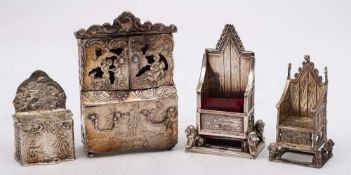 A Continental silver miniature model of a bureau bookcase, bears import marks for London, 1898: 8cm.