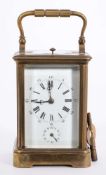 A French Corniche quarter-repeating carriage clock: the eight-day duration movement having a