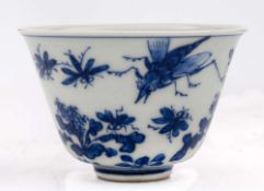 A Chinese porcelain wine cup: painted in blue with crickets,
