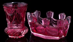 A Bohemian ruby flashed cut glass bowl and a similar beaker: the octagonal bowl on hobnail cut base,