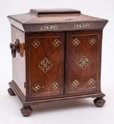 A Victorian rosewood and mother-of-pearl inlaid table top vanity cabinet: with shallow domed hinged