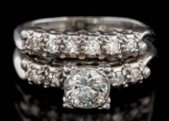A diamond mounted ring: the principal round brilliant-cut diamond estimated to weigh 0.