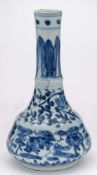 A Chinese porcelain vase: of mallet shaped form painted in blue with five horses in a landscape