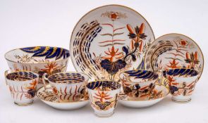 A Spode 'Imari' porcelain part tea service: painted in the so called 'Banana Tree' pattern,