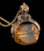 A mid 19th Century citrine mounted swivel seal: of chased foliate design,