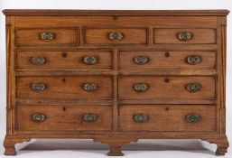 A George IV mahogany mule chest:, the hinged top with a moulded edge,