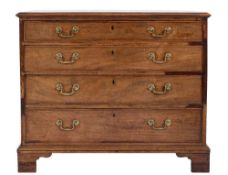 A George III mahogany rectangular chest:, the top with a moulded edge,