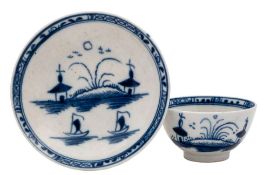 A Caughley blue and white 'toy' tea bowl and saucer: painted with the 'Island' pattern of sailing