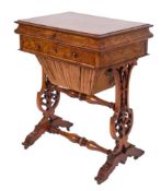 A Victorian walnut combined writing and work table:, the burr figured hinged moulded top,