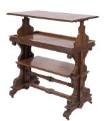 A Victorian carved oak and parquetry three tier harlequin dumb waiter:,