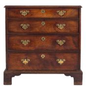 A George III mahogany rectangular chest:, the top with a moulded edge,