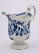 A Liverpool [Philip Christian] blue and white milk jug: of helmet shape with 'biting snake' handle,