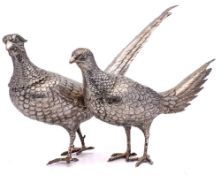 A pair of Continental silver pheasants, bears import marks for Berthold Muller, Chester,