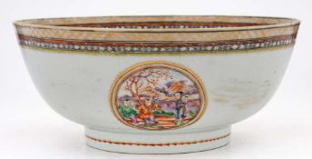 A Chinese Export famille rose bowl: painted in the Mandarin palette with three medallions depicting