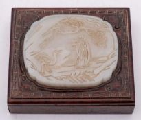 A Chinese pale celadon jade plaque: of foliate rectangular form,