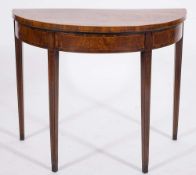 A George III mahogany and inlaid half round card table:,