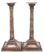 A pair of 19th Century Sheffield Plate candlesticks,