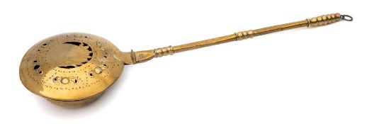 An early 18th century brass bed warming pan: possibly Dutch,