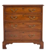 A George III mahogany rectangular chest:, the top with a moulded edge,