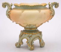 A Royal Worcester porcelain blush-ivory pedestal jardiniere: of spiral lobed form with green ground