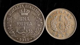 A 1915 Italian Somalia Rupee, together with a Chinese coin: (2).
