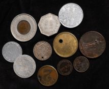 A bag of tokens including an engraved coin for 'Sgt.