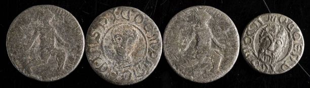 A group of four lead tokens:.