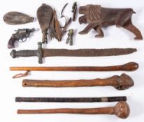 A French model 1862 side arm in excavated condition:, together with three root wood clubs,