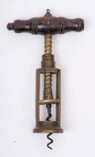 A 19th Century brass double bar corkscrew: the turned rosewood handle over an open frame body with
