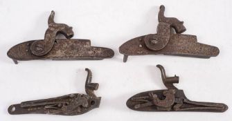 Four hammer gun locks, one signed W & J Davis,