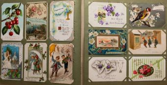 Three Edwardian part-filled postcard albums: containing greetings cards,