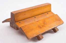 An apprenticeman's section of pine hull:, the central keel with two ribs, plank and pinned strakes,
