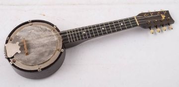 A George Houghton & Sons six string rosewood banjo in fitted case.
